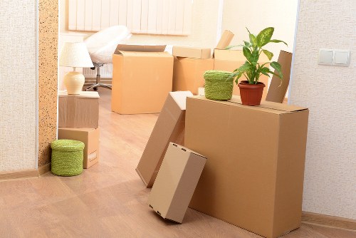 Professional movers handling furniture for removals in Harrow on the Hill